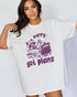 Model wearing white color shirt with 'Sorry Got Plans' raccoon watching TV graphic design